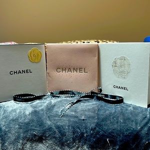 Three medium size authentic Chanel gift boxes. Used but good condition.